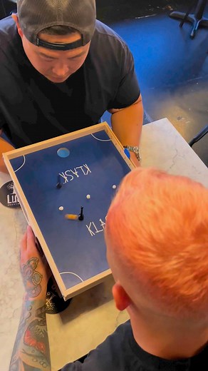 Epic magnetic battle! 🧲💪 #KLASK #boardgames #gameplay Throwback to these two battling it out hard on the eve of the National championships! | KLASK