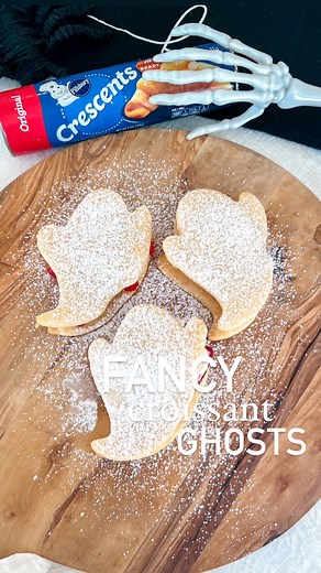 Fancy croissant ghosties 🥐👻 Our favorite donut spot makes the best fancy croissants and you know we had to recreate them with a spooky twist Recipe: @pillsburybaking crescent roll dough cut in the shape of a ghost Bake at 350° for 9 minutes Add sliced strawberries and @reddiwip to one ghost croissant Top with another ghost and sprinkle powdered sugar to top Serve right away enjoy save for later share with friends follow for easy holiday ideas ✨ #halloweensnacks #halloweendessert #halloweentrea