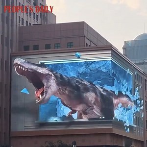 Be ready for a surprise as a kangaroo and a dinosaur burst out of the screen in this #3D display in Beijing that has gone wild! #AmazingChina | Beautiful China