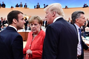 Macron awkwardly corners Trump during G20 photo after another handshake 'tug-of-war'