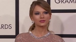 Taylor Swift shines in mesh dress