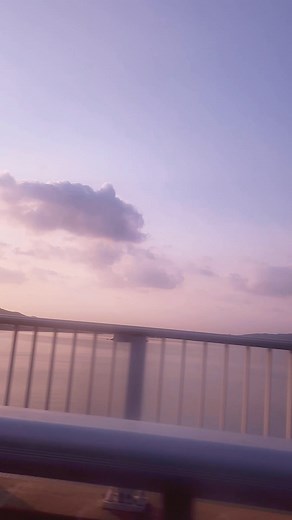 Lavender Horizon Over the Bridge A tranquil scene captures the soft hues of dusk as purple clouds drift across a lavender sky. The bridge railing frames the calm water below, where the fading daylight reflects in gentle shades of pink and violet, evoking a sense of quiet motion and serenity. #LavenderSky #SunsetView #BridgeScene #EveningGlow #PurpleHues #TranquilWaters #SoftClouds #PastelSky #NaturePhotography #SereneMoments #SkyArt #everyoneシ゚viralシviralシfypシ゚viralシalシ #followmeシ゚ #fbreelsfypシ゚