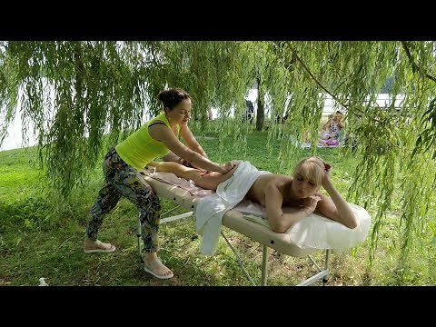 Full body Massage for beautiful girl. Massage in the Park