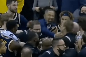 Video Shows Juwan Howard Swing at Wisconsin Coach After Michigan Loss, Brawl Ensues