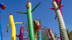 Wavy Arm-Flailing Inflatable Tube Men Scare Off Looting Dingoes In Australia