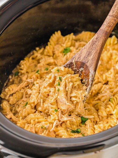 This Slow Cooker Italian Chicken Pasta is one of those easy dinners I rely on when the day is full. It's the perfect easy dinner recipe for the family made in the crock-pot! ▢ 1 pound chicken breast, (boneless and skinless) ▢ 16 oz Italian dressing ▢ 10.5 oz cream of chicken soup ▢ 8 oz cream cheese ▢ 1/2 cup grated parmesan cheese ▢ salt and pepper, to taste ▢ 10 oz rotini pasta