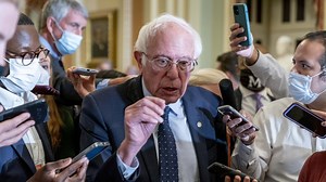 Sanders takes a hard line against demands by Manchin, Sinema