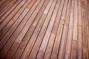 How to Stain a Deck After Adding New Boards