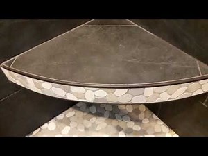Curved floating corner bench