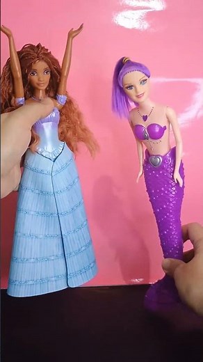 Cute purple mermaid and transforming Ariel