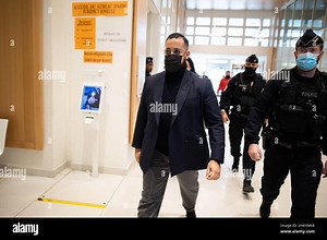 Alexandre Benalla arrive at the courtroom to hear the verdict in his trial on charges of assaulting a young couple during a May Day protest in 2018 when he was French President bodyguard. The presidency was accused of a cover-up for failing to report Benalla to the police until French daily Le Monde revealed the existence of a video showing him striking a young man and grabbing a young woman by the neck. The former bouncer, now aged 30, was wearing a police helmet, even though he had only been g