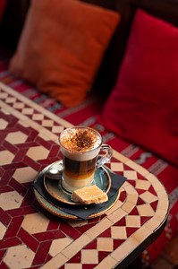 There is no better coffee than a Barraquito. Traditional coffee from Tenerife with layers of Licor 43, condensed milk, espresso and milk foam - finished with a sprinkling of cinnamon | Cafe Andaluz