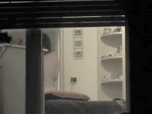 I am voyeuring neighbor in panty in the window