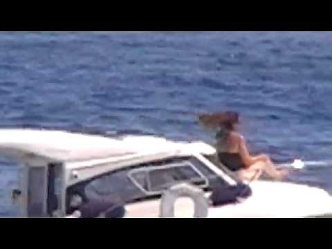 Beauty sunbathing on Cabin Cruiser.Hot Summer Holidays on the Sea 17