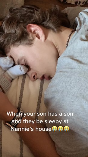 Sleepy Grandson and Dad's Heartwarming Moment at Nannie's House