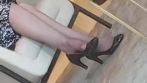 My favorite shoeplay lady again. She didnt drop the shoe this time, but she does this deep toe wiggling in her shoes. She does this pointy toe flex... | By Johnny