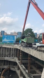 Long hand excavator dredging mud | Agricultral Harvers