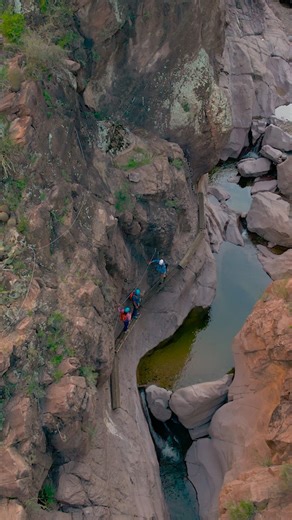 Explore the depths of Crater Canyon, a stunning slot canyon where you'll be guided through the history of this bold landscape. . . . . #castlehotsprings #hotsprings #arizonatravel #arizona #tlpicks #resorts #soakinnature #canyoneering | Castle Hot Springs