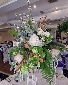 Fab new table décor available 🤍 Deluxe floral toppers on clear geo stands Go half and half on your tables with trees making a fab combo of venue styling plus aisle styling 😎 Win win on the floral styling 🤍 | Passion Flowers Wedding & Event Florist's