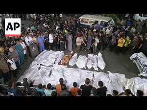 Bodies line up outside Gaza hospital as Israeli airstrikes continue