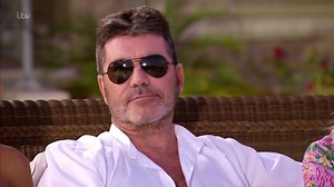 Simon Cowell tells Sam to 'take her mask off' during audition