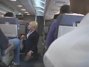 Flight Attendant Sucking A Passenger's Cock