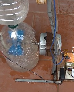 Turning the motor of a washing machine into a water turbine generator! | MetDaan DIY