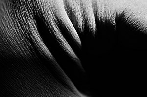 Photographer explores subconscious mind through dark and intimate skin macro photos