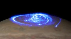 Hubble Tracks Bright Auroras on Jupiter | NASA This composite video illustrates the auroras on Jupiter relative to their position on the giant planet. As on Earth, auroras are produced by the interaction of a planet's magnetic field with its atmosphere. The Jupiter auroras observed by NASA's Hubble Space Telescope are some of the most active and brightest ever caught by Hubble, reaching intensities over a thousand times brighter than those seen on Earth. Hubble's sensitivity to ultraviolet light