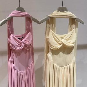 The Muse, now in mini. Introducing the short version of our best-selling Muse Gown—same iconic draping, now made to flirt. Available in Butter Yellow & Salmon Pink. For weddings, rooftop soirées, and everywhere you want to turn heads. | COCO SIN | Facebook