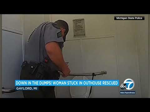 Woman rescued from outhouse toilet after climbing in to retrieve Apple Watch, police say