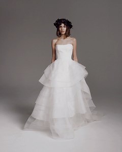 This romantic #VeraWangBride wedding dress features a stretch crepe corset bodice featuring a dramatic tiered ruffle princess skirt! https://bit.ly/3tg6yhH | Designer Bridal Room, Hong Kong | Facebook