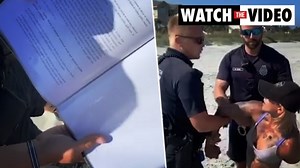 Woman detained by police over bikini