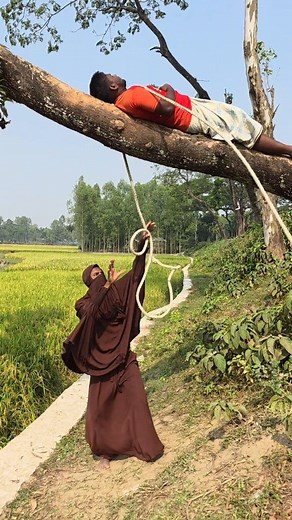 Woman pulling rope | Asadul Islam