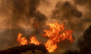 California wildfires: Flames pour from homes as blaze spreads