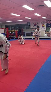 Adults Han Mu Do Our 1st Dan Black Belt, Sasha, executing solid Nak Sul (falling techniques) | Family Self Defence Academy