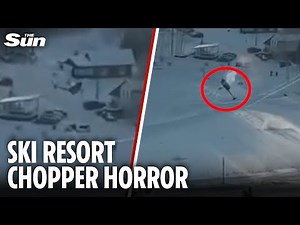 Horrifying moment helicopter CRASHES into ski lift cables at mountain resort