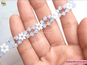 2.1K views · 96 reactions | How to Make a Beautiful Grey and White Beaded Bracelet | Wedding Decoration Ideas | Facebook