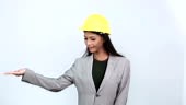 Dark Tan Skin Office Woman in Gray Suit wear Yellow Safety Hard Hat...