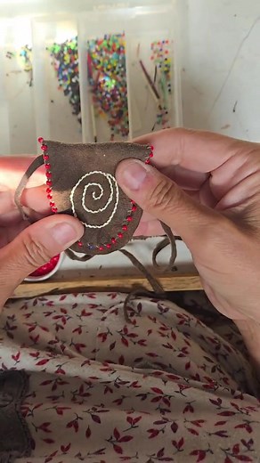 Finishing up the beadwork on a small pouch. #beadwork #asmrsounds #quillwork | Djuana Tucker