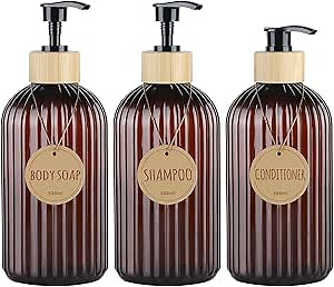 A set of three shampoo and shower gel dispensers, a reusable hair care liquid dispenser weighing 16.9 ounces, and an empty plastic bottle shower soap dispenser with a waterproof label, (Amber color)