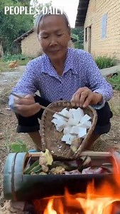 98K views · 1.2K reactions | The grandma cooked local cuisine, fish soup, in a bamboo tube harvested from Yaoshan Mountain, central China’s Hunan province. | People's Daily, China | Facebook