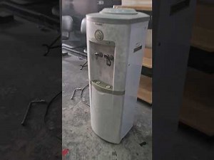 Enveloping brushed graphite steel drinking fountain