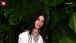 Camila Morrone, 25, stuns in thong bikini at beach with dad