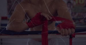 clip-3981097649-boxer-pulling-red-wrap-initiating-wrist-support