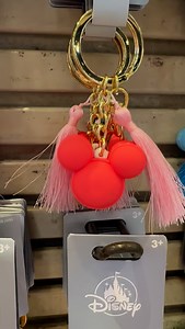 I’m not sure exactly when Disney keychains became the hot accessory, but they are everywhere and they are adorable! I’m currently obsessed with the Mickey macarons. 🩵🩷💚💛 #mickeymacaron #disneykeychain | The Disney Fashionista