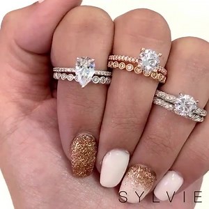 Three times a charm when it comes to our sparkling #StackableBands & #Solitaire engagement rings! 💗 We can't get over these dazzling stacks for your #WeddingSet - would you stack them? sylviecollection.com #SomethingSylvie #SylvieCollection #Brides #Bridal #Style #Fashion #DoubleHaloEngagementRings #Engagement #Diamonds #DiamondRing #Jewelry #Rings #SolitaireEngagementRings #IDo #SheSaidYes #Bride #SYLVIE #Engaged #DiamondEngagementRings | Sylvie Jewelry