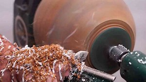 Woodturning an old piece of oak with resin-filled craters