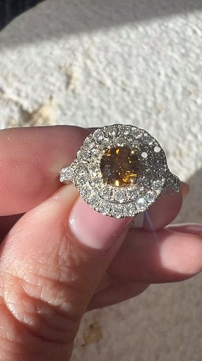 Winter sun catching all the sparkles in this Natural Orange Diamond Ring ✨ specs below: 0.51 ct Round Orange Diamond 52 = 0.62 cts white diamond halo and band Set in 18 ct White gold Available now #orangediamond #orangediamondring #doublehaloengagementring #hopediamonds #coloureddiamonds #perthcoloureddiamonds | Hope Diamonds | Facebook