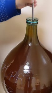 2.4K views · 11 reactions | Demijohn maturation on lees with stirring @vinaaranda . Follow @thewinearound for more on wine and around . #thewinearound #demijohn #bonbonne #damigiana #damajuana #batonnage #leesstirring | Thewine Around | Facebook